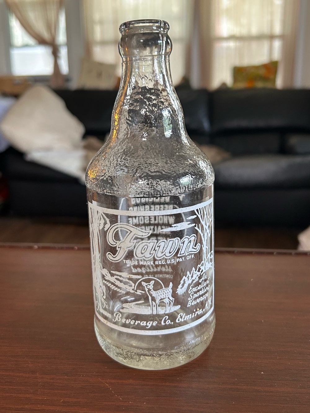 Vintage Fawn beverage company 12 ounce bottle bottled in Elmira New York.